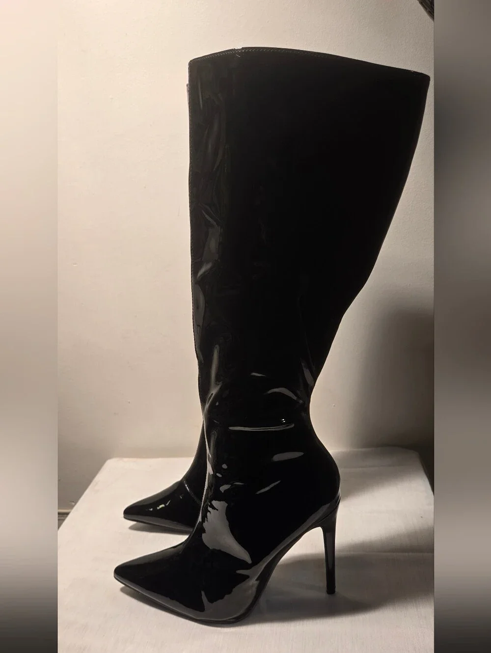 Fashion Nova Black Patent Pointed Toe Knee-High Stiletto Boots.